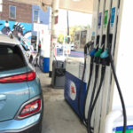 electric vehicle at petrol station