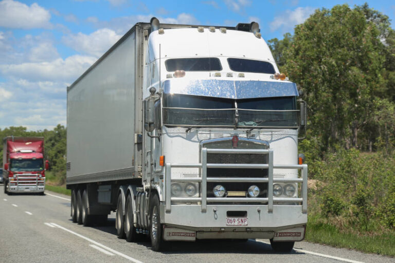 Truck prime mover driving down road in Australia