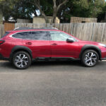 novated subaru outback touring red