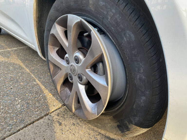 flat tyre off the rim damaged