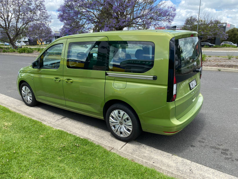 VW Caddy Life metallic green rear view