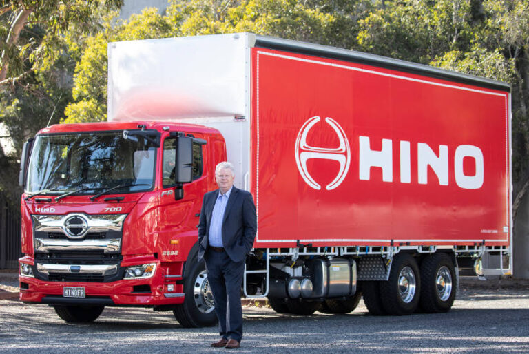 Richard Emery standing in front of Hino 700 truck