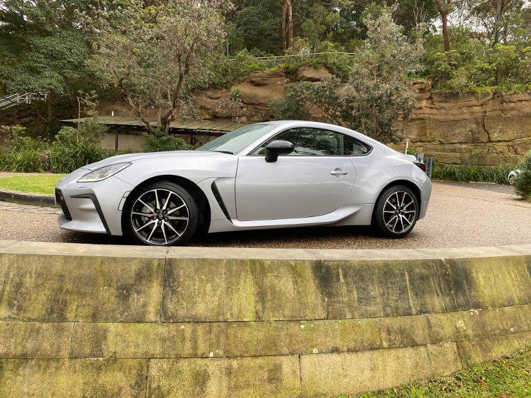 Toyota 86 in grey side view in bushland