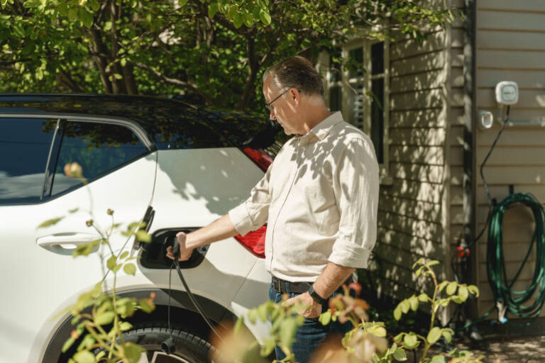 A man Home charging his EV with Jet Charge