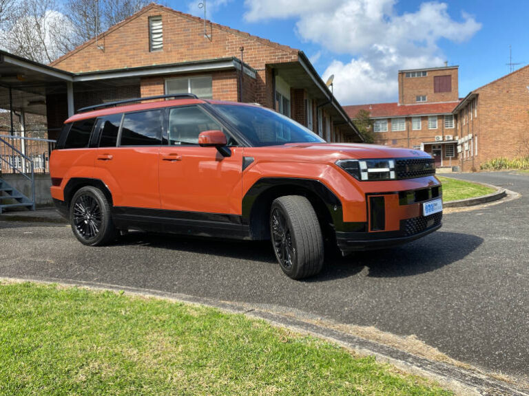 Hyundai Santa Fe Calligrapht Terracotta Orange side view