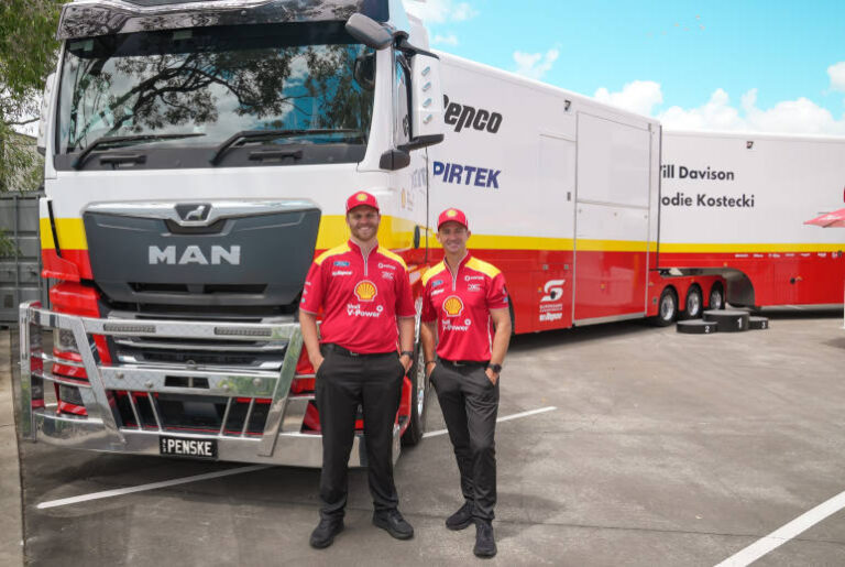 Supercar race team with transporter